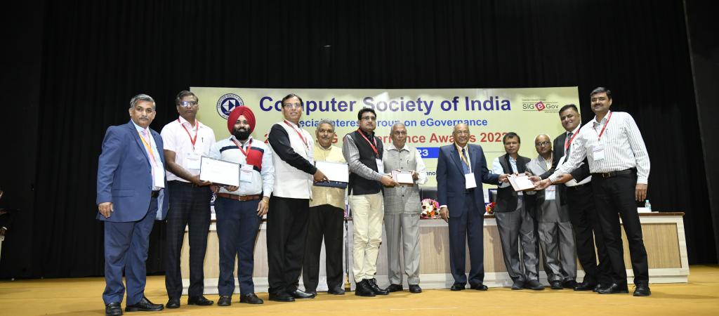 Sh. Deepak Bansal,SIO,NIC,Haryana, Sh. MP Kulshreshtha, Sr. Director IT,Sh. Pardeep Kumar Kaushal, Sr. Director IT and Sh. Amit Bansal receiving award