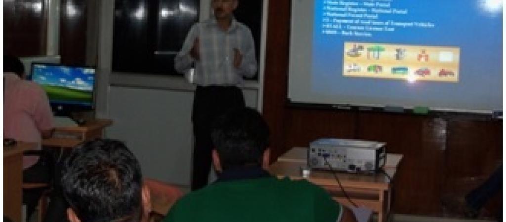 NIC- Haryana Transport Project Coordinator addressing the participants