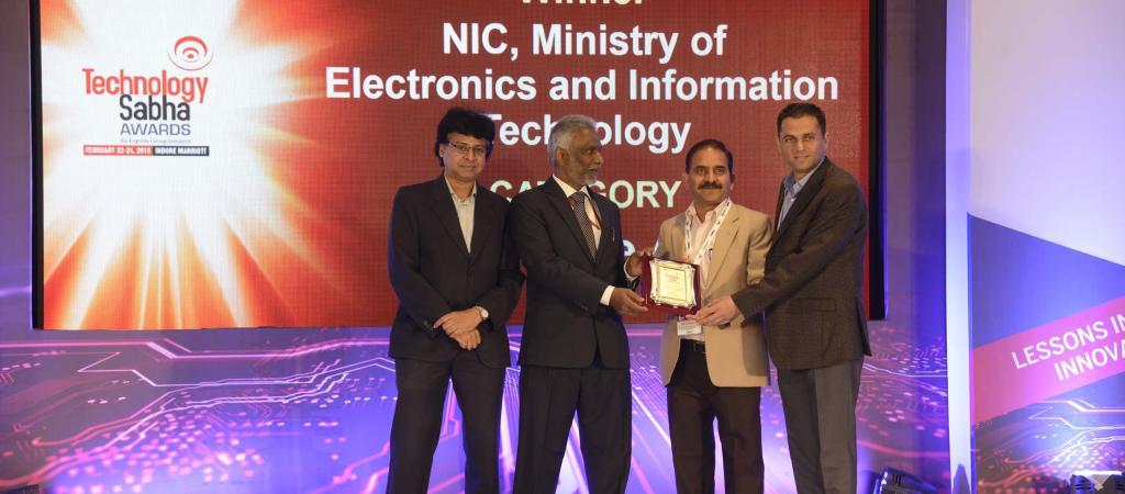 Sh. Vimal and Sh. Parveen receiving the Award