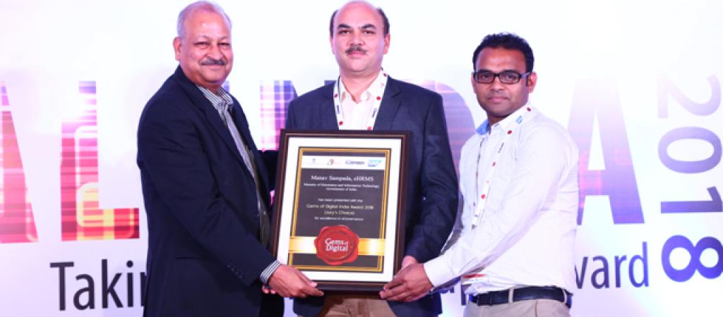 Gems of Digital India Award 2018 being Received by Sh. Sanjay Kumar, TD and Group Head along with Sh. Rahul Kumar