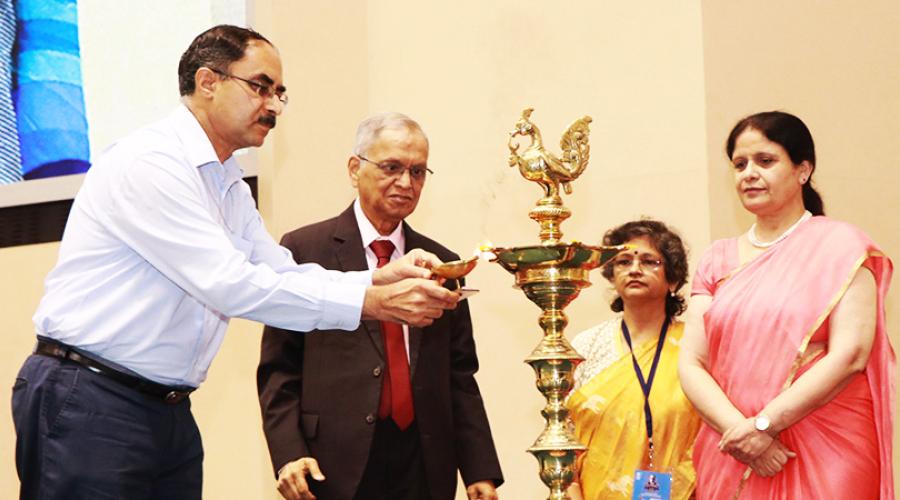 Dignitaries lighting the ceremonial lamp 