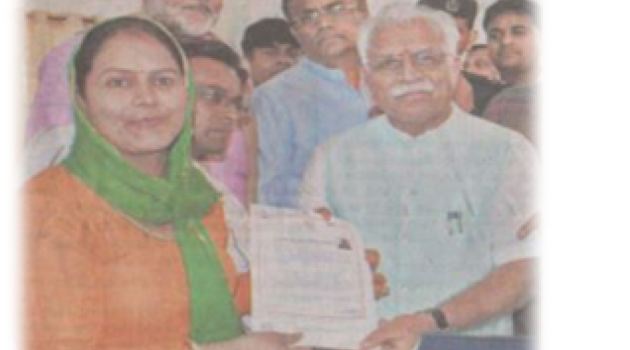 Honble CM distributing receipt of certificate to applicant