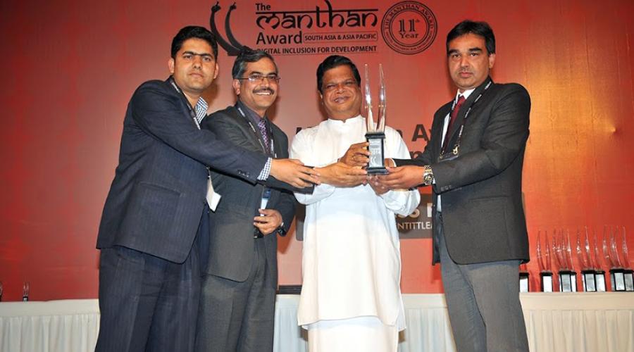 Honourable Minister of Education, Government of Sri Lanka presenting the Award in N.Delhi