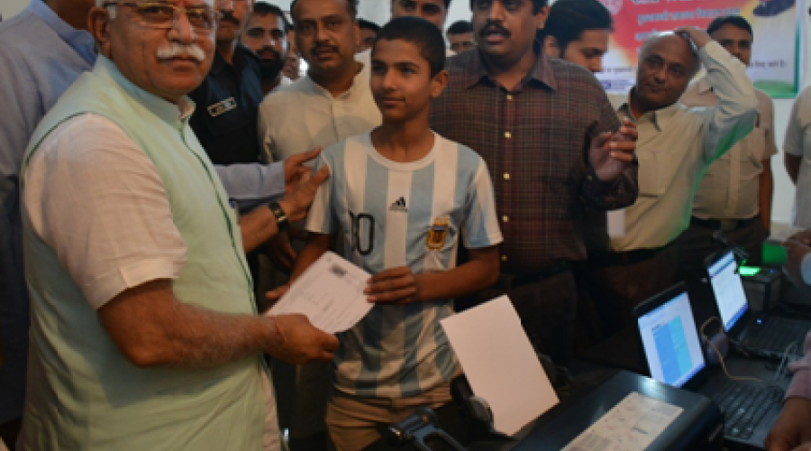 Honble Chief Minister distributing receipt of certificate to an applicant