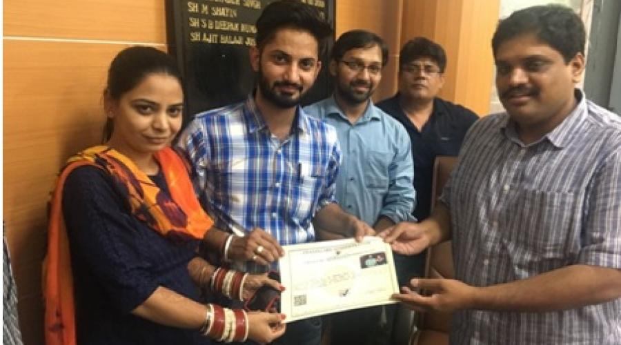 Sh Ajit Balaji Joshi, IAS Deputy Commissioner, Chandigarh handing over the first certificate generated through the system