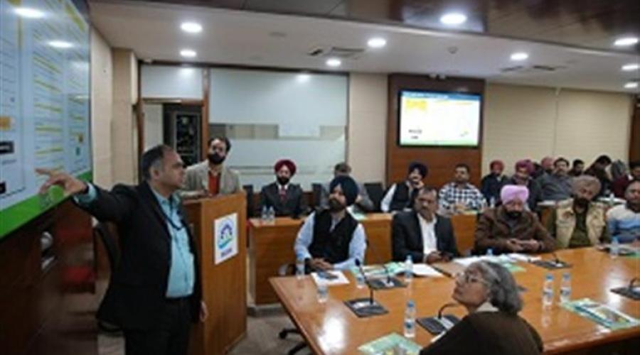 NIC official conducting a detailed presentation on the eDAR system, demonstrating its features for real-time accident reporting and streamlined claim